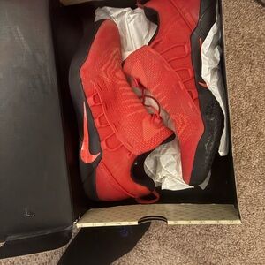 Red and Black Athletic Shoes